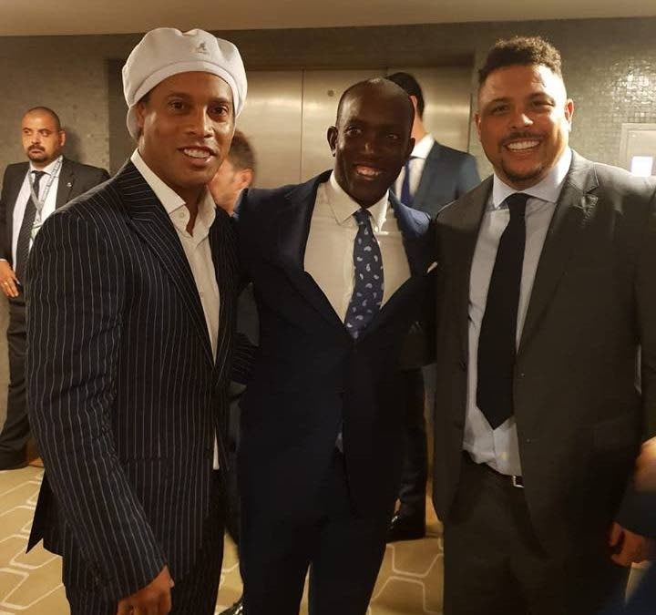 Dwight Yorke (centre) with legendary Brazil forwards Ronaldinho (left) and Ronaldo.