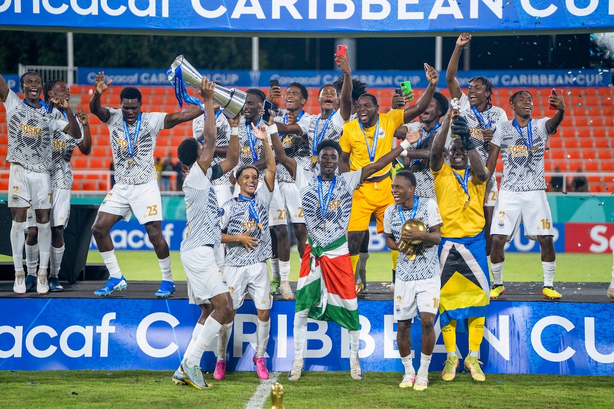 Kaïlé Auvray (front row, second from left) celebrates with his Cavalier FC teammates after winning the 2024 Concacaf Caribbean Cup on away goals against Dominican Republic's Cibao FC on Tuesday, December 3rd 2024.