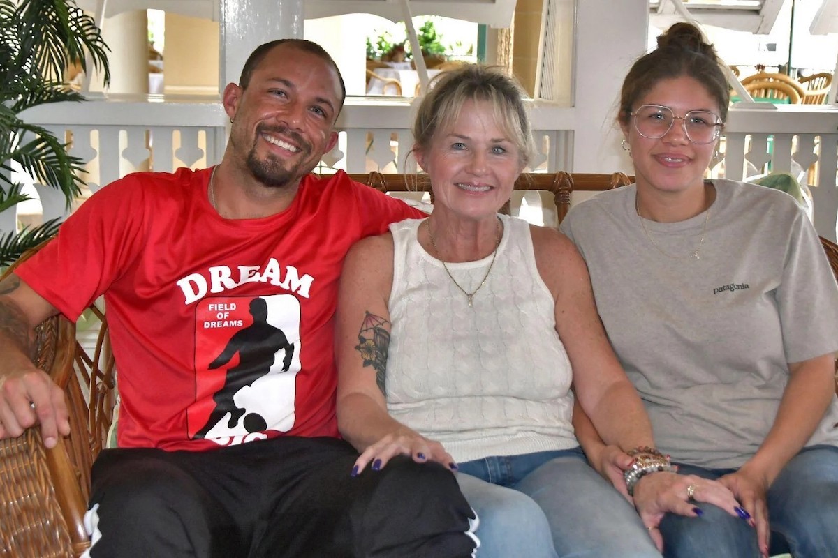 FAMILY TIME: Kristy De Leon, wife of ailing ex-national footballer Leroy De Leon, centre, with daughter Jessica and son Nicholas at the Royal Hotel, San Fernando on Wednesday, January 8th 2025. PHOTO BY Trevor Watson