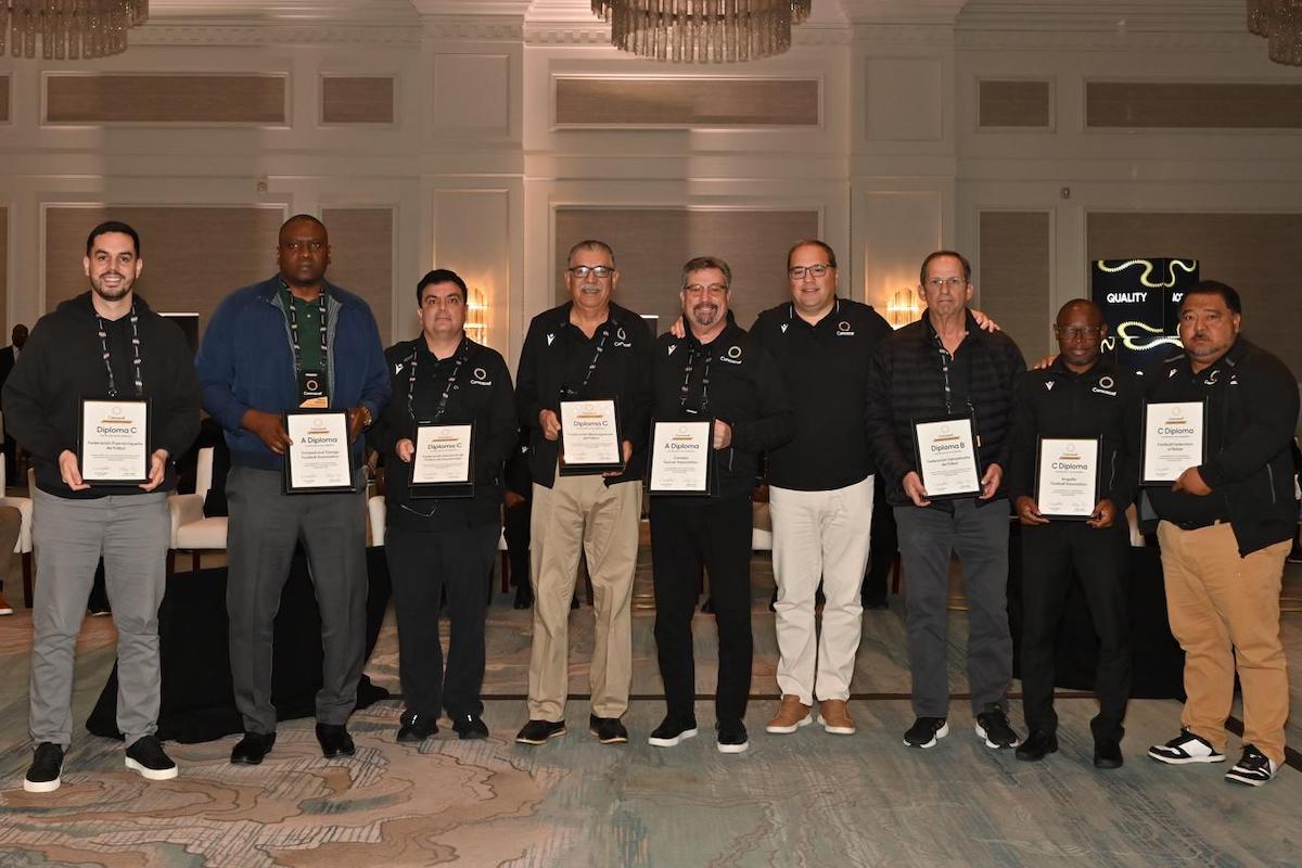 TTFA President Kieron Edwards (second from left) seen here with the Concacaf A License Recognition certificate