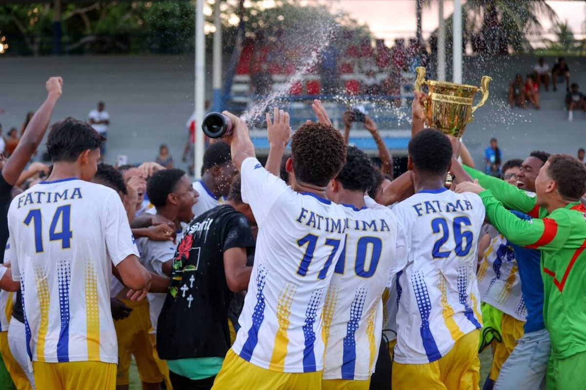 Fatima College players celebrate their 2023 SSFL Premiership title after defeating Naparima College 2-1 during the SSFL Premiership match, at Naparima Grounds, Lewis Street, San Fernando on October 28th 2023.