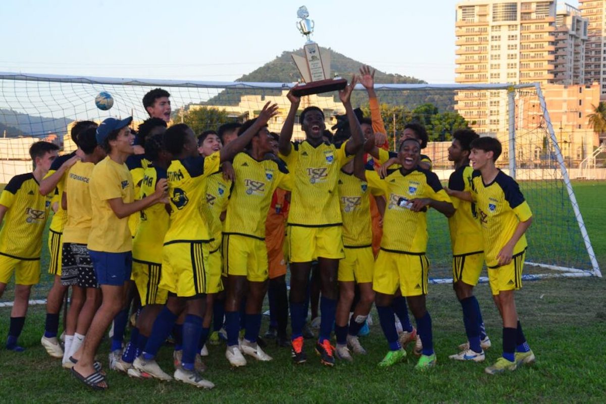 Fatima College’s Under-16 football team celebrates after beating Signal Hill 1-0 in the SSFL national under-16 final, on Monday, December 2nd 2024, at Fatima Grounds, Mucurapo. PHOTO BY Ronald Daniel