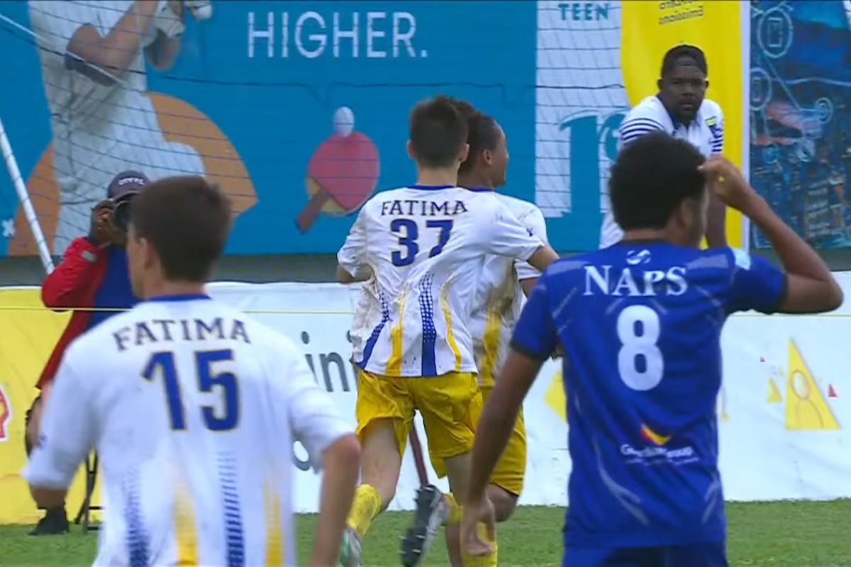 Fatima's Caden Trestrail (#37) congratulates Luke Correia on scoring the equalizer against Naparima College at Fatima Ground on Wednesday, September 18th 2024.