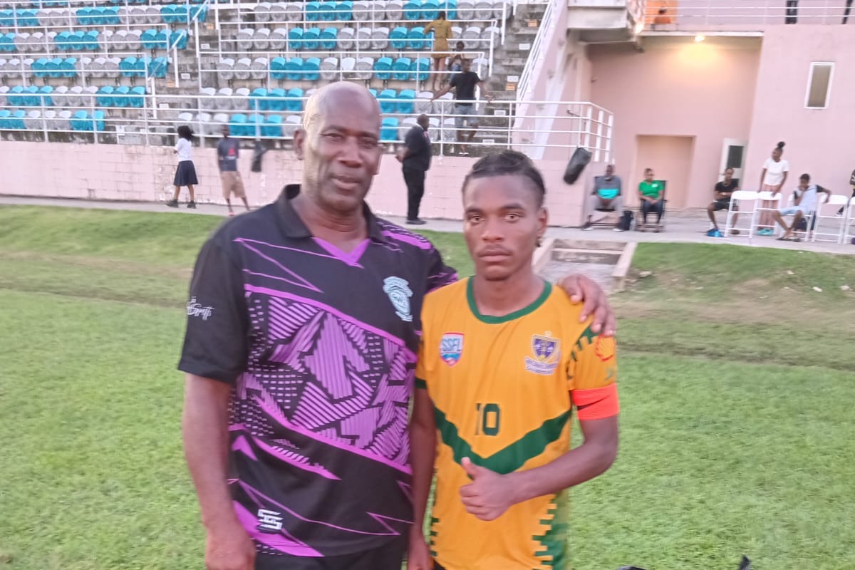 Siparia West Secondary Head Coach Dexter Francis (left) and St. Benedict's captain Derrel Garcia (right) pose for a photo after their South Zone Intercol quarterfinal match at Mahaica Sporting Complex, Point Fortin on Friday, November 8th 2024.