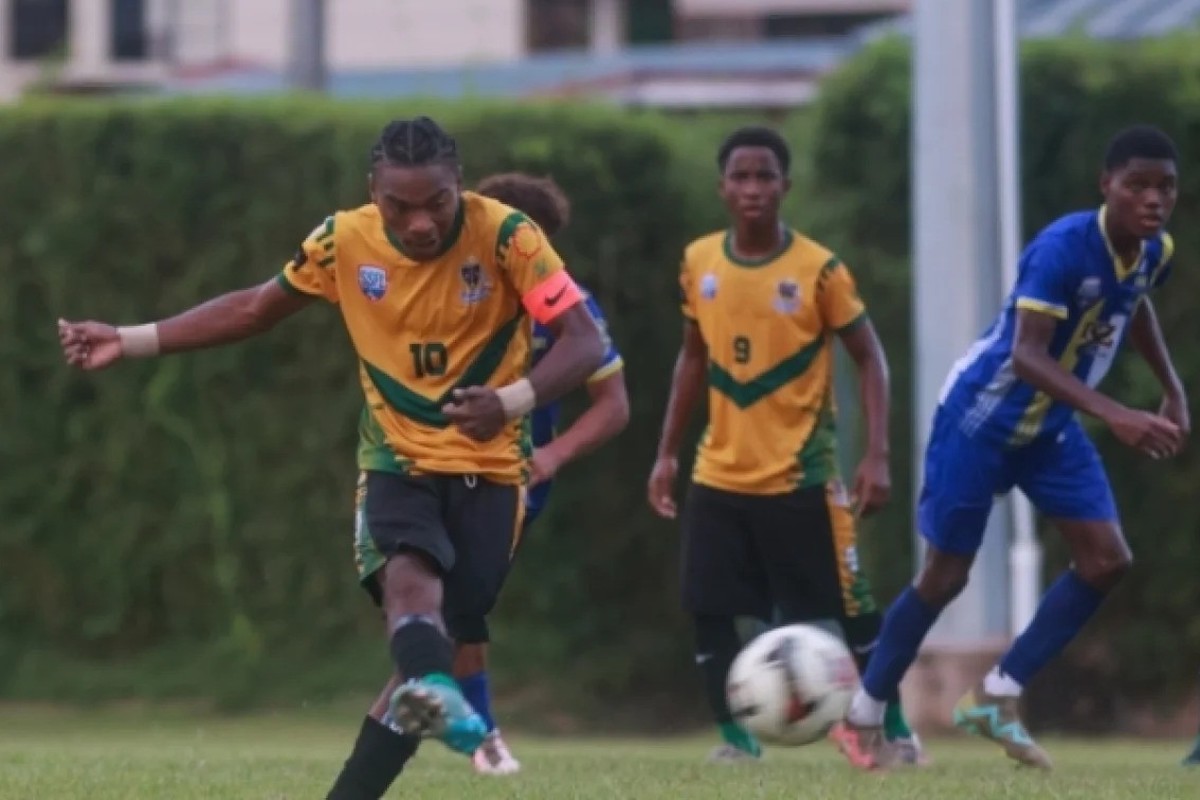 St. Benedict's College's Derrel Garcia takes a shot at goal during an SSFL match against Fatima College at Mahaica Sporting Complex, Point Fortin on October 5th 2024.