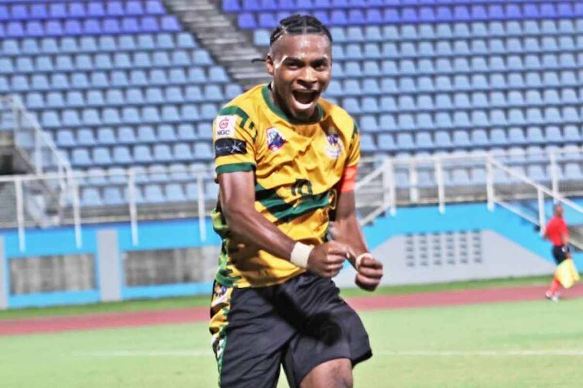 St Benedict's College captain Derrel Garcia celebrates after scoring against Fatima College in the Coca-Cola Boys Intercol final at the Ato Boldon Stadium, Couva on December 5th 2024. PHOTO BY Lincoln Holder