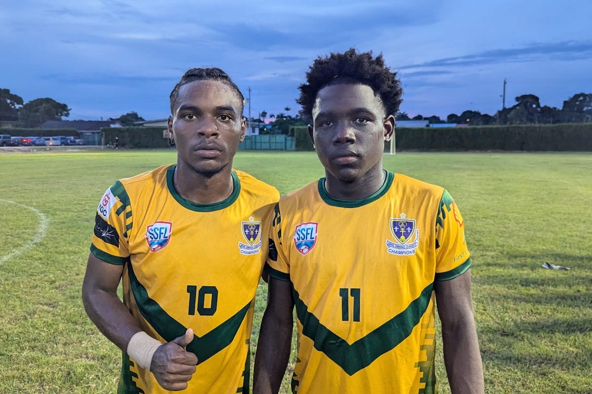 St. Benedict's College goalscorers Derrel Garcia (left) and Ethan Thomas (right) pose for a picture after a 3-1 win against Fatima College at Mahaica Oval, Point Fortin on Saturday, October 5th 2024.