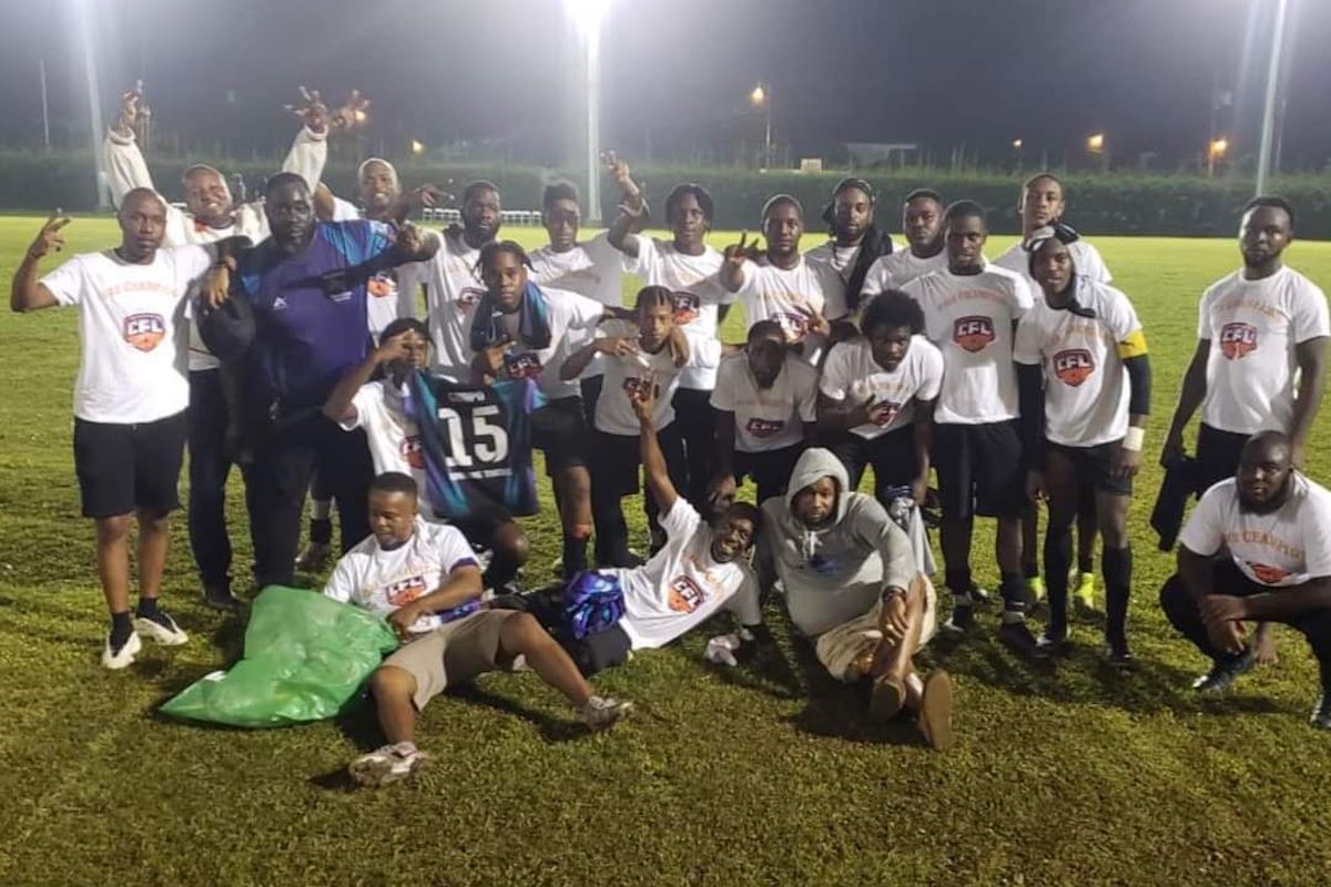 Players and staff of the Guapo Uprising Youths celebrate after defending their title in the Deportivo Point Fortin (PF) Community Football League (CFL) winning the final against La Brea All Stars, 3-0, at the Mahaica Sports Complex in 2023.