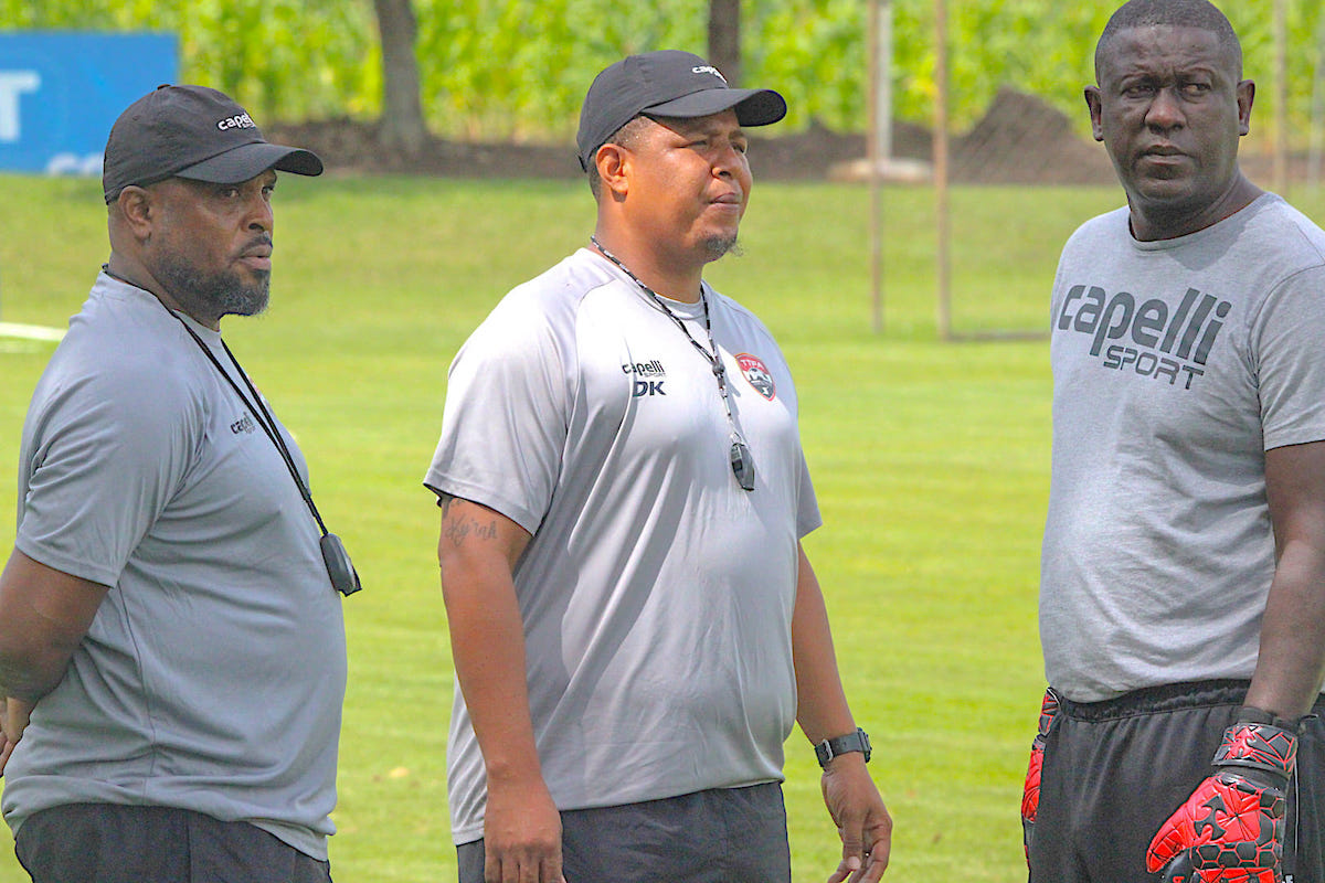 Trinidad and Tobago Interim Coach Derek King (center), Assistant Coach Walt Noriega (left), and Goalkeeper Coach Ross Russell (right) watch over a training session in Tegucigalpa, Honduras on Wednesday, September 4th 2024.