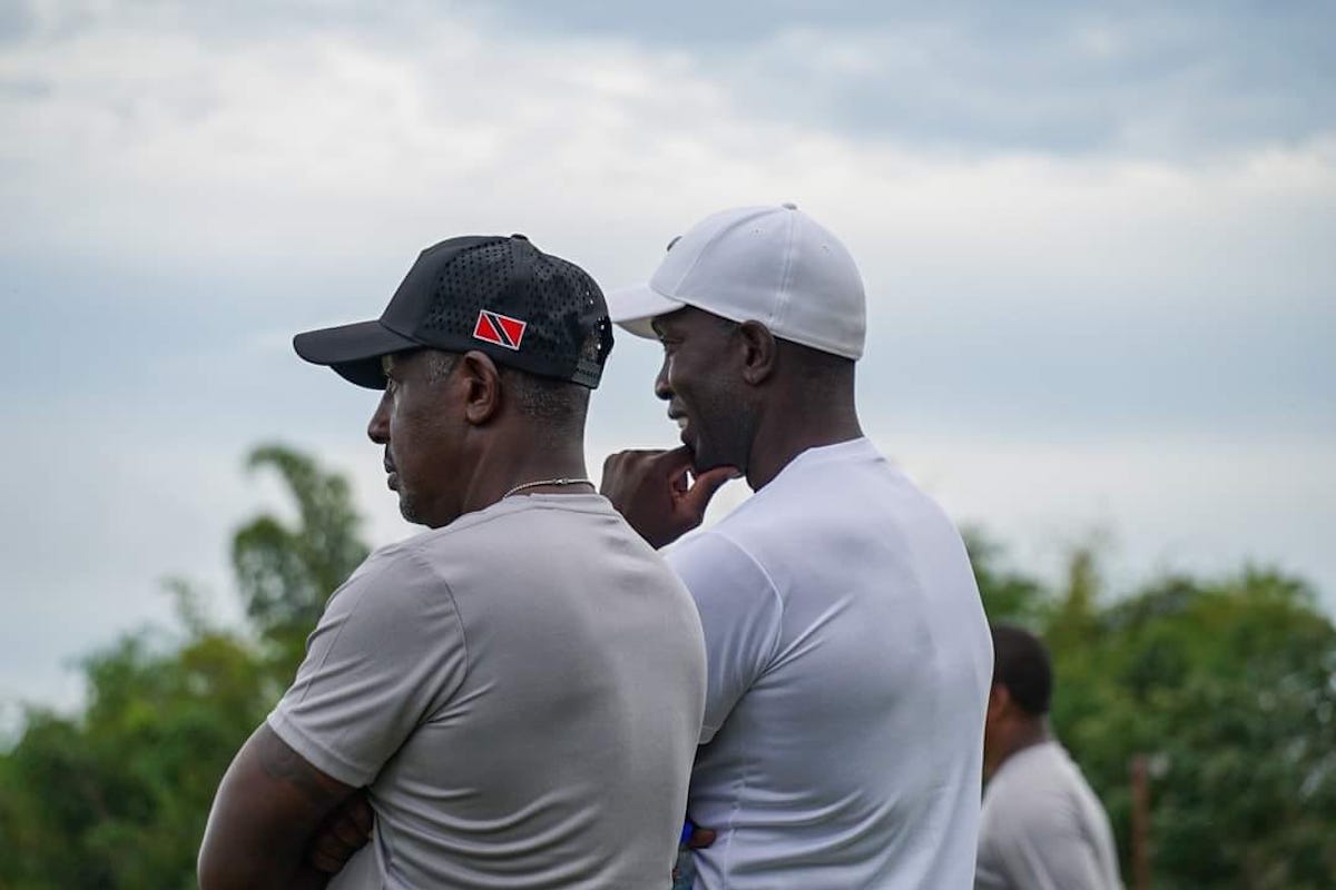 Trinidad and Tobago Head Coach Dwight Yorke (right), and Assistant Coach Russell Latapy (left) observe a training session at Ato Bolton Stadium, Couva on Tuesday, November 12th 2024.