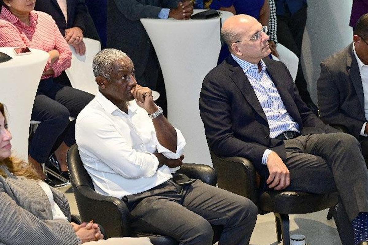 Former Trinidad and Tobago footballer and coach Russell Latapy, left, listens attentively during the launch of good friend Brian Lara’s book, Lara: The England Chronicles, at Lara’s Lady Chancellor residence, on Tuesday, September 17th 2024. PHOTO BY Jermaine Cruickshank