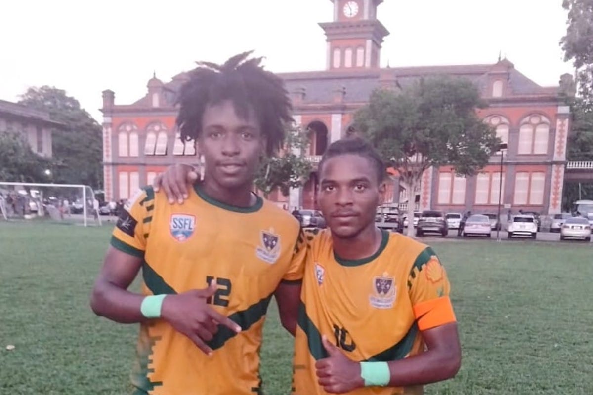 St. Benedict's College goalscorers Josiah Ochoa (left) and Derrel Garcia (right) pose for a picture after a 2-1 come-from-behind win against Queen's Royal College atQRC Ground on Wednesday, October 10th 2024.