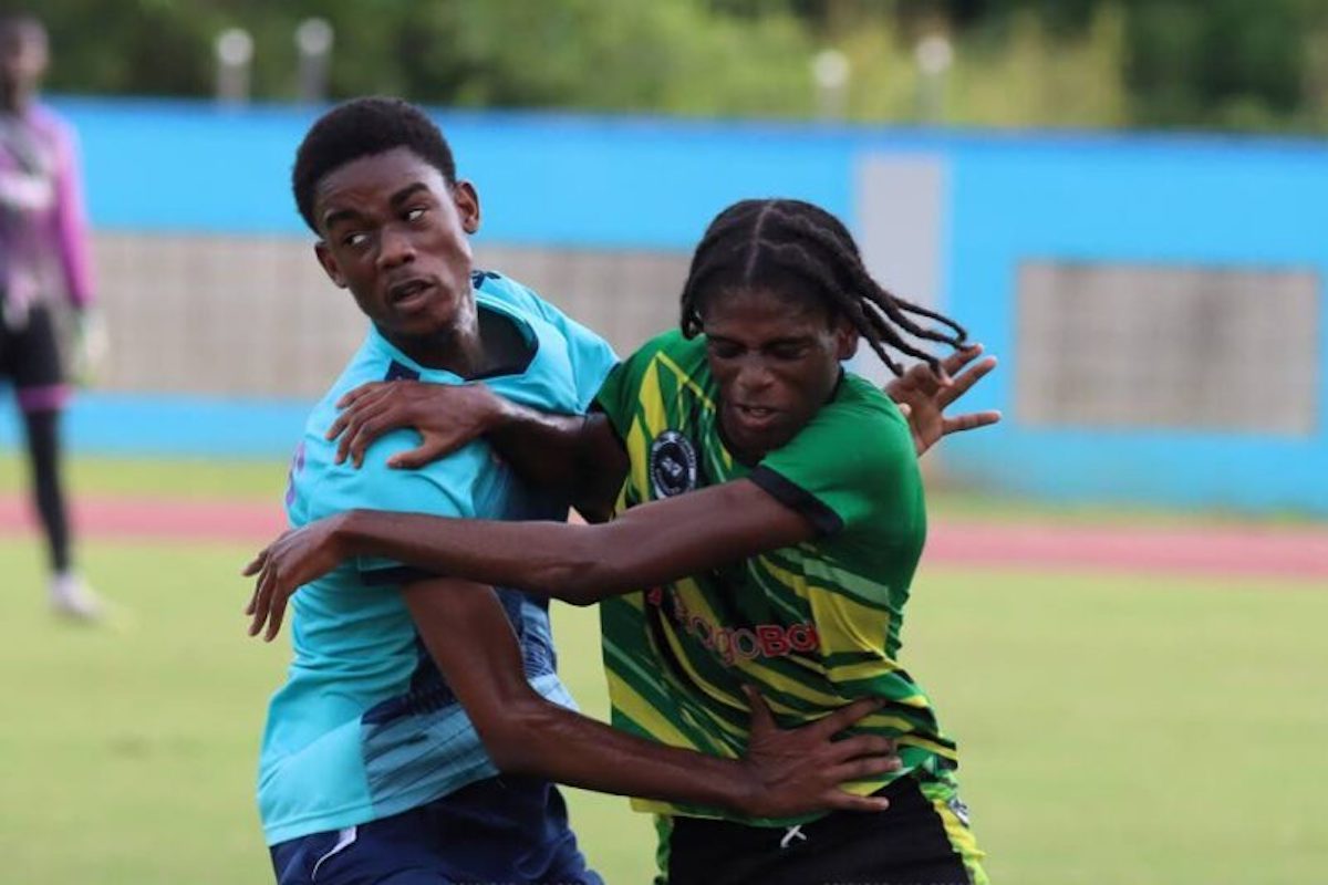 Signal Hill Secondary’s Israel Trim (R) and Miracle Ministries’ Immanuel Marchan in action during the Coca-Cola national intercol quarterfinal, on Tuesday, November 26th 2024, at the Ato Boldon Stadium, Couva. PHOTO BY Angelo Marcelle