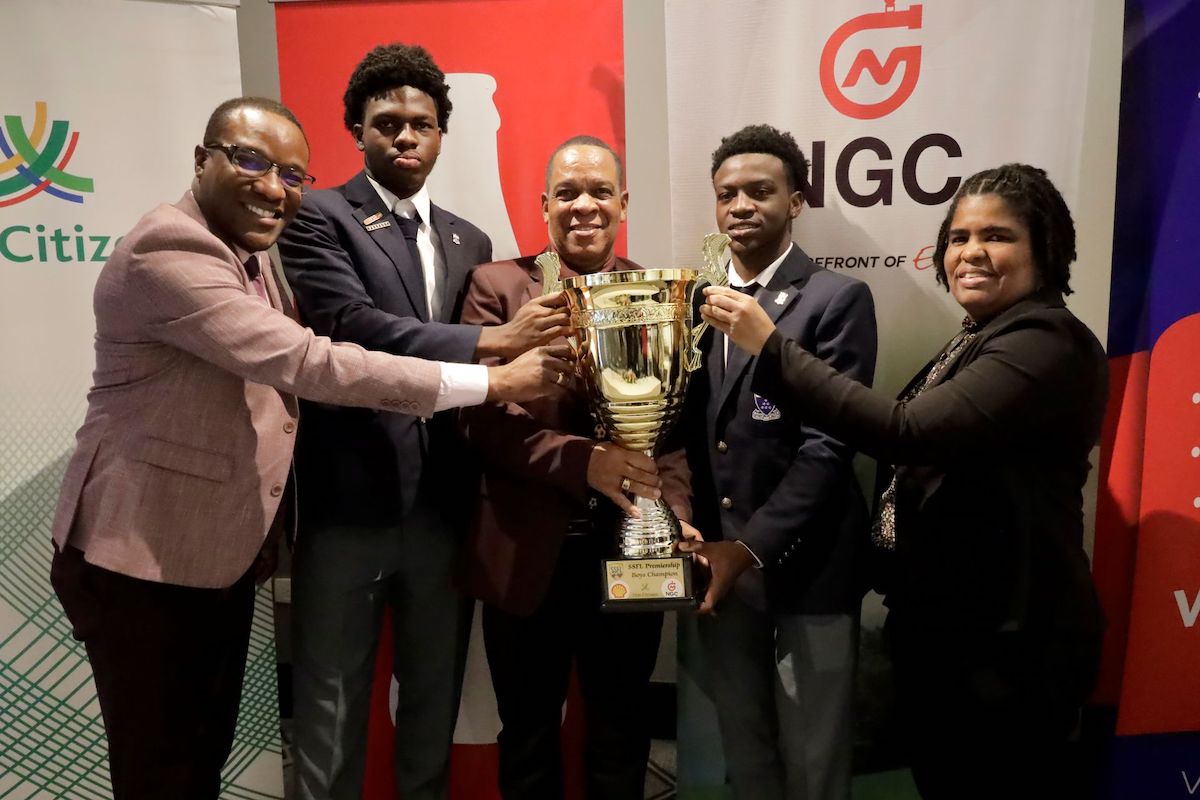 Sports and community development ministry PS David Roberts, left, Fatima college's centre back Yohance Atherton, Secondary School Football league president Merere Louis Gonzales, Fatima college's Midfielder Jedaiah King and ministry of Education PS Simone Williams, at the launch of SSFL 2024 season, at the Brix hotel, St. Ann's, on Wednesday, August 28th 2024. PHOTO: Nicole Drayton