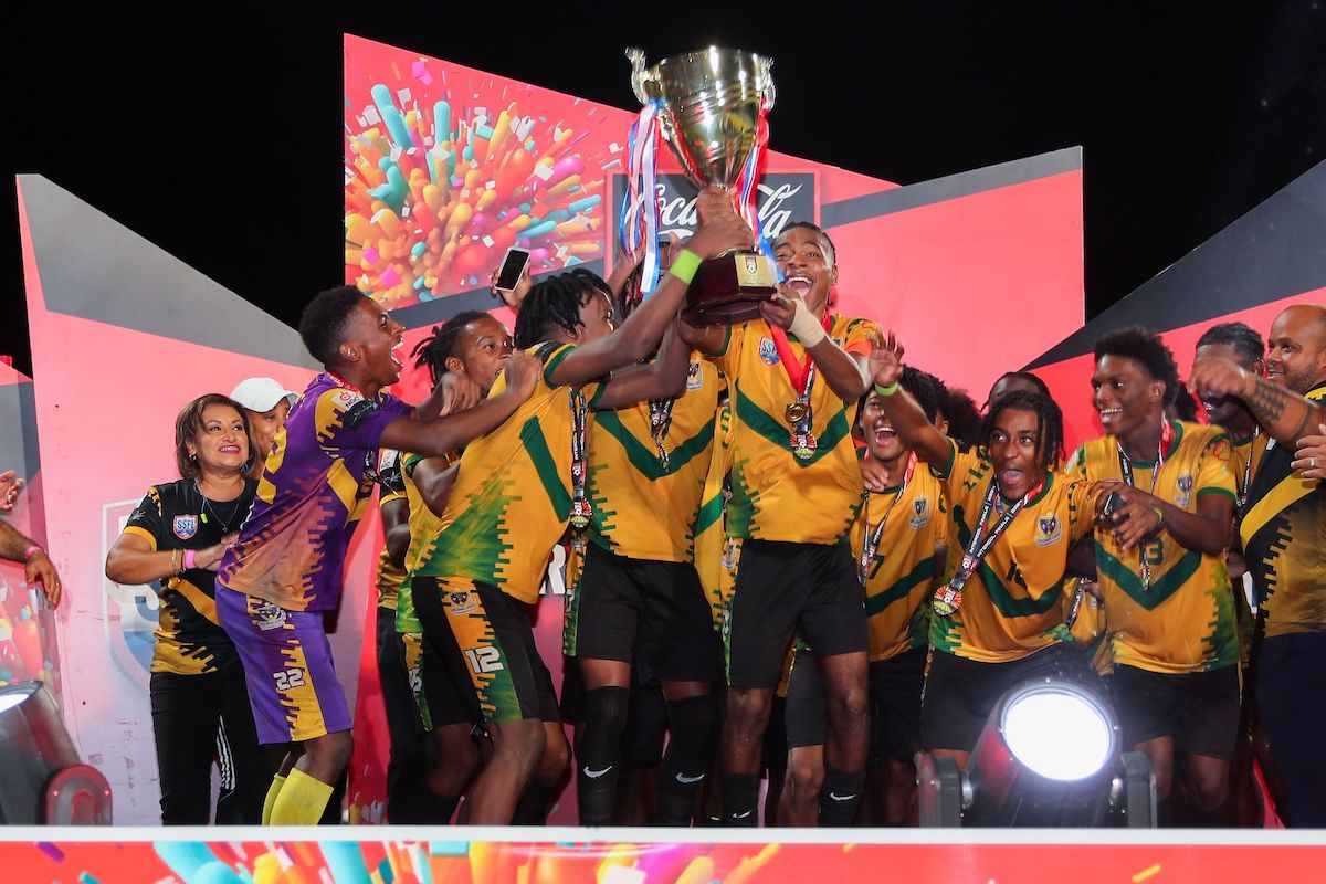 Players of St Benedict's College celebrate the 2024 Secondary Schools Football League National Coca-Cola Intercol title after their 2-0 win over Fatima College at the Ato Boldon Stadium in Balmain, Couva on Thursday, December 5th 2024.  PHOTO BY Daniel Prentice