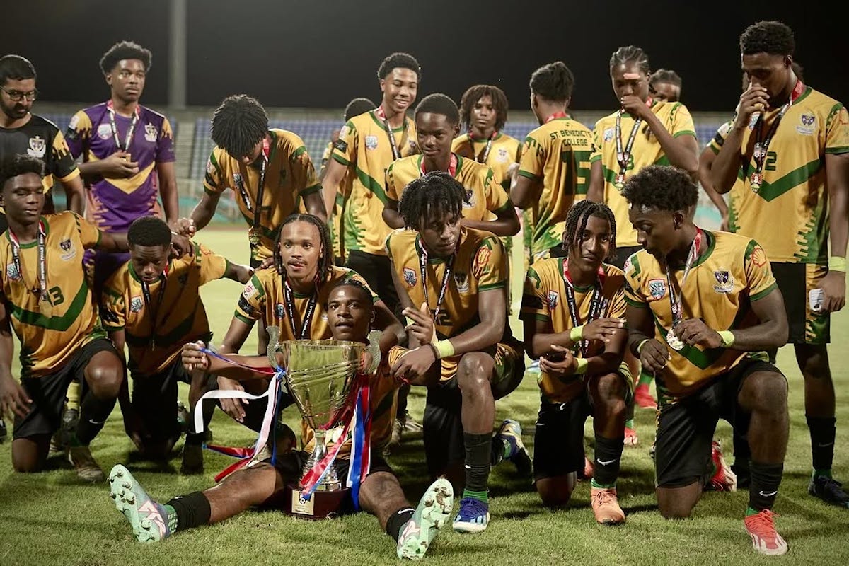 St. Benedict's College players celebrate after winning the 2024 Secondary Schools Football League National Coca-Cola Intercol title against Fatima College at the Ato Boldon Stadium in Balmain, Couva on Thursday, December 5th 2024.