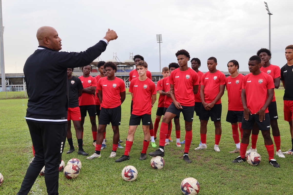 Trinidad and Tobago Men's U-17 Head Coach Shawn Cooper instructs his players during a training session at the Ato Boldon Stadium Training Ground, Couva on Monday, December 30th 2024.