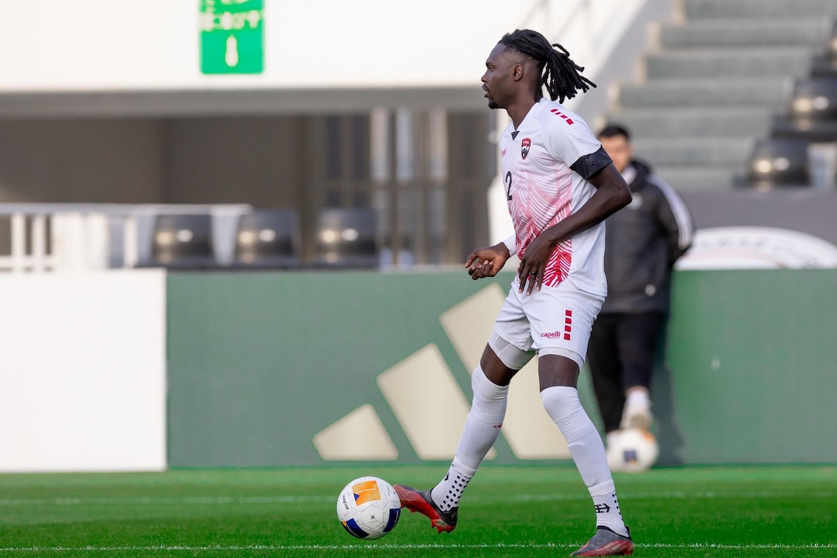 Soca Warriors captain Aubrey David looks for a passing option versus Saudi Arabia in a friendly international at the Al Shabab Club Stadium in Riyadh, Saudi Arabia on Tuesday, December 17th 2024.