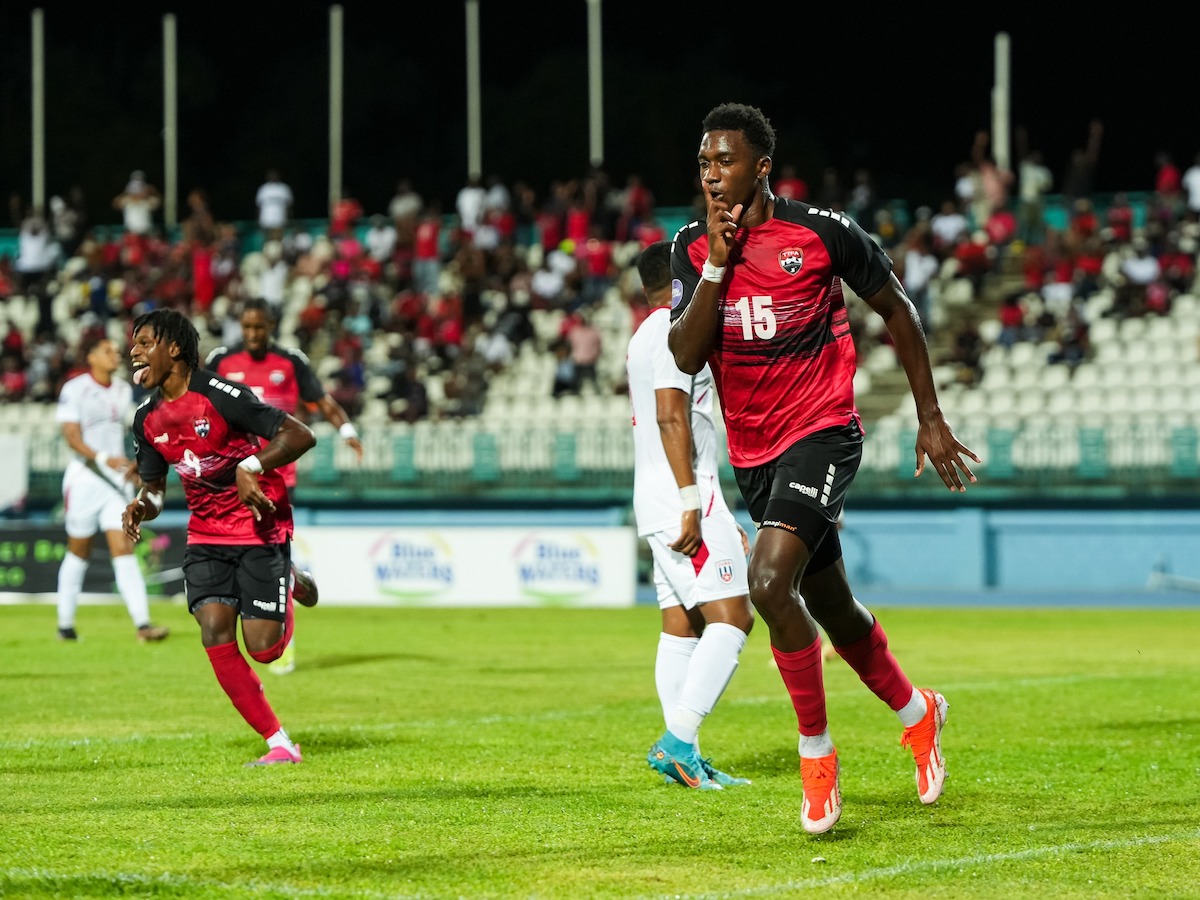 Trinidad and Tobago's Dantaye Gilbert (right) celebrates after scoring his side's opening goal against Cuba in a Concacaf Nations League match at Dwight Yorke Stadium, Bacolet, Tobago on Monday, October 14th 2024.