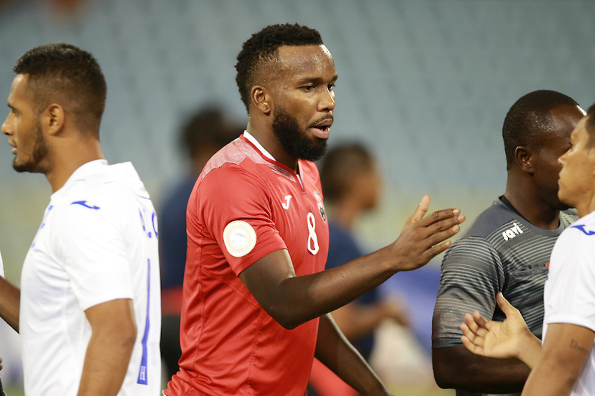 Captain Khaleem Hyland greets Honduran players before a Concacaf Nations league match between Trinidad and Tobago and Honduras on October 10th 2019 at Hasely Crawford Stadium, Trinidad and Tobago