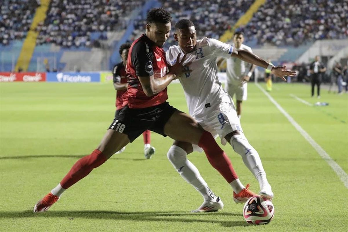 Trinidad and Tobago's Alvin Jones (left) battles Honduras' Joseph Rosales (right) for the ball during a Concacaf Nations League match at Estadio Nacional Chelato Uclés, Tegucigalpa, Honduras on Friday, September 6th 2024.