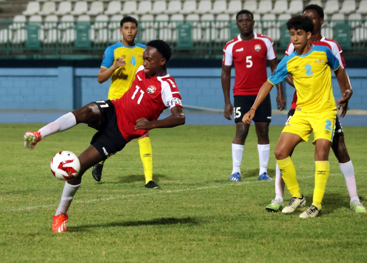 Trinidad and Tobago U-14 captain Adasa Richardson (#11) takes a shot on goal during a CFU Under-14 Boys' Challenge Series match against Aruba at the Dwight Yorke Stadium, Bacolet, Tobago on Saturday, August 17th 2024.