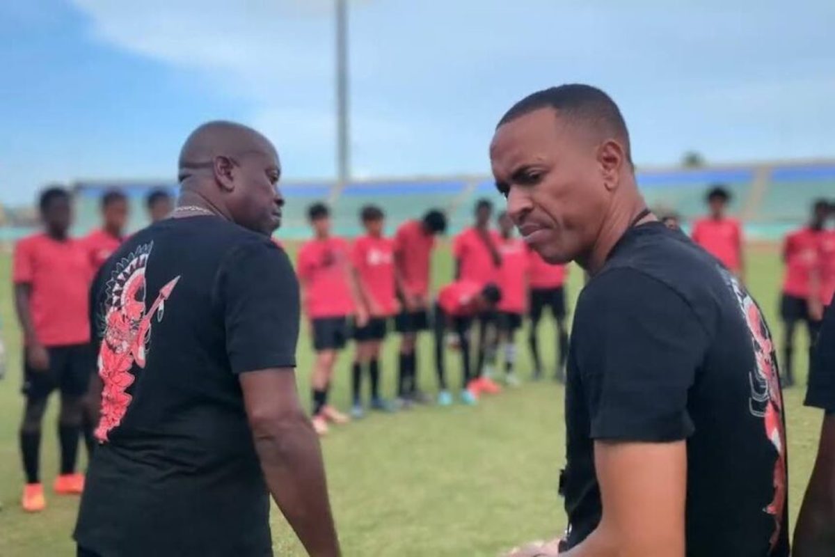 T&T U14 coach Densill Theobald, right, with other officials before addressing the national U-14 team. They are preparing for the CFU U-14 tournament which kicks off in Tobago from August 16-25, 2024.