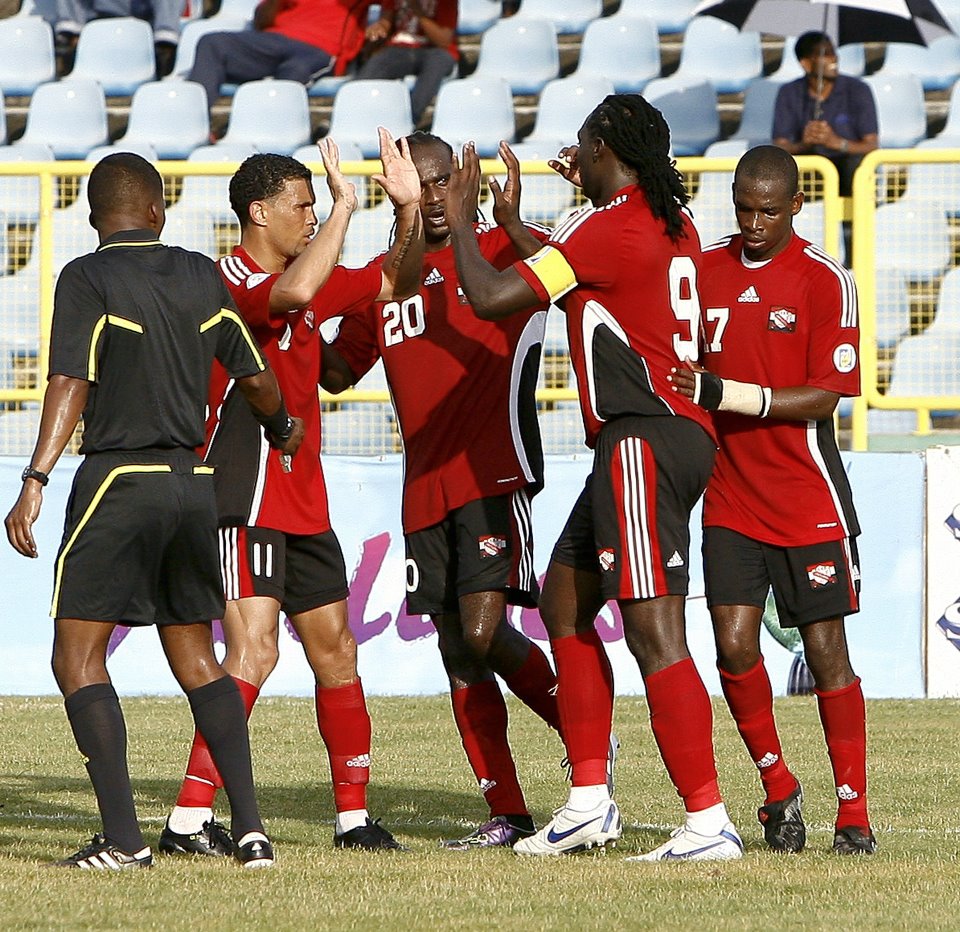 T&T players celebrate against Bermuda