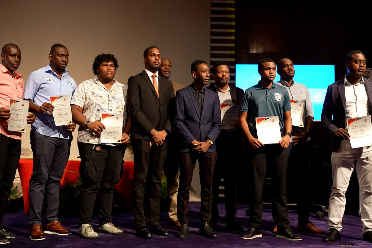 Several club officials display their new T&T Premier Football League licences during the league's launch on Tuesday, November 19th 2024, at the National Academy for the Performing Arts (NAPA), Port of Spain.